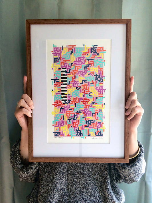 Framed 90's Aerobics gouache pattern artwork held by artist for size reference