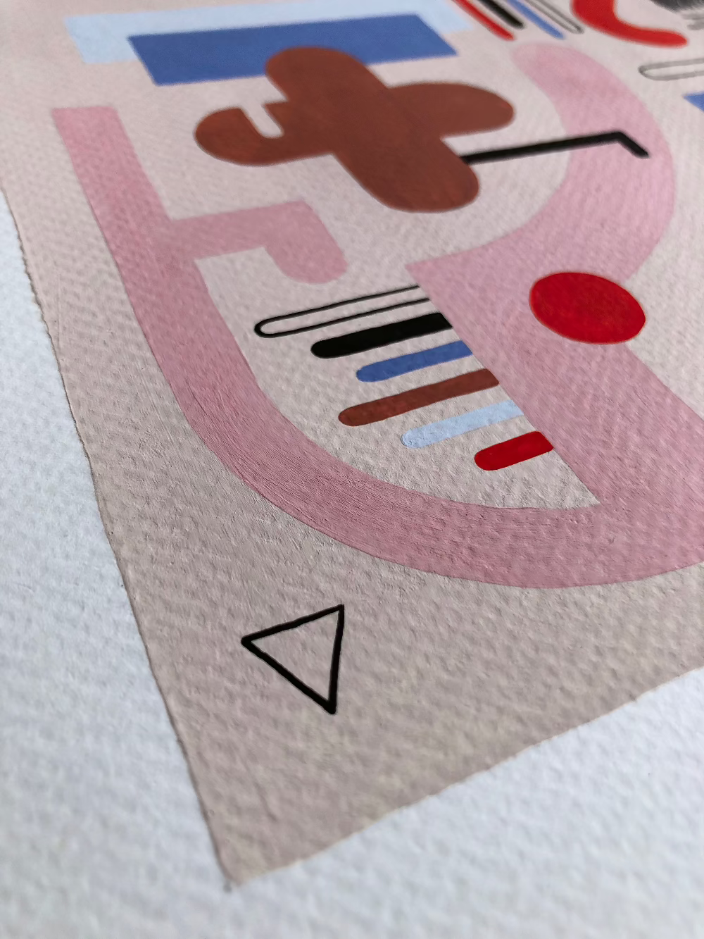 Close up of unframed abstract artwork with gouache and fine liner