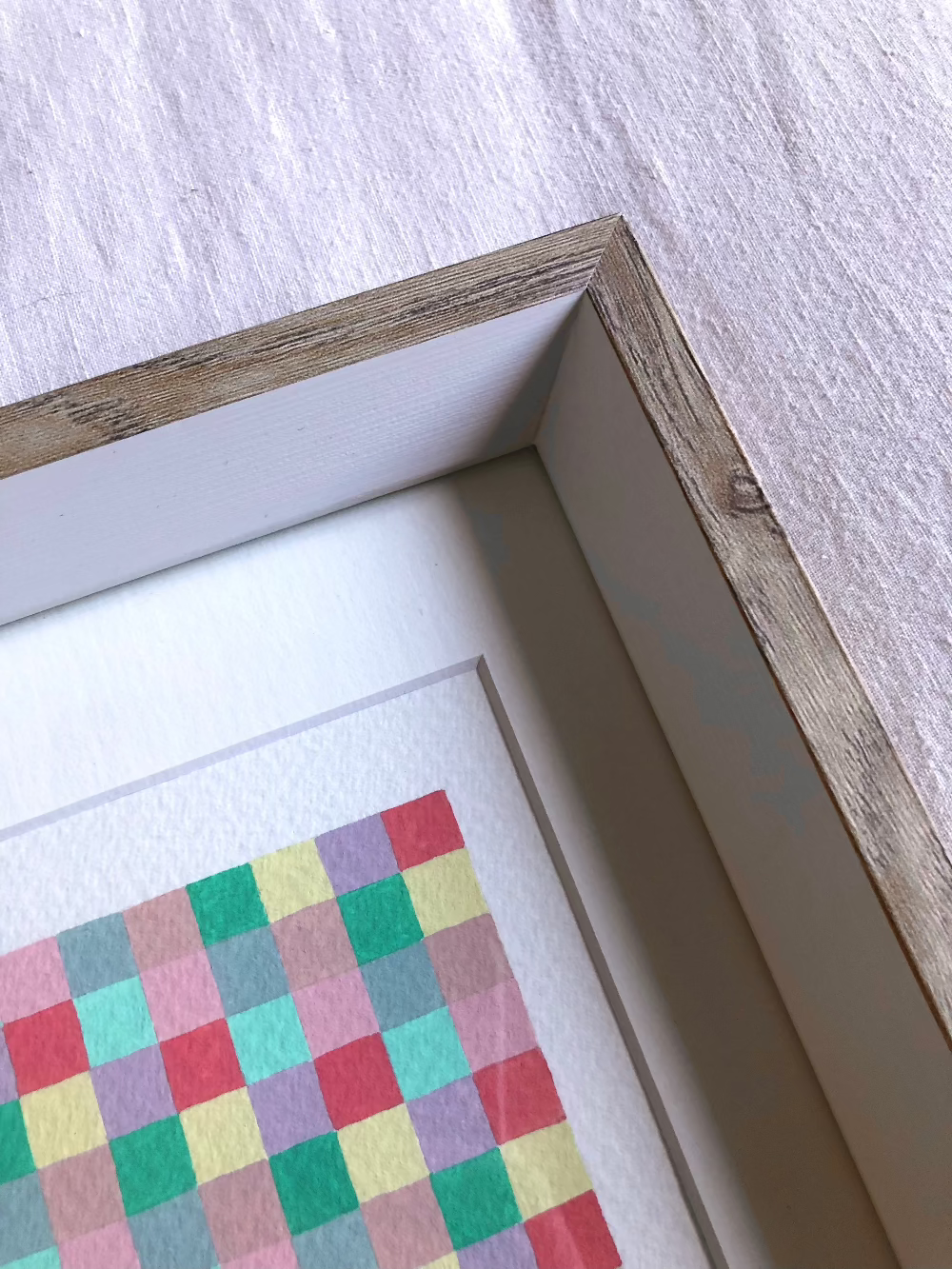 Close up of the corner of the frame of the artwork