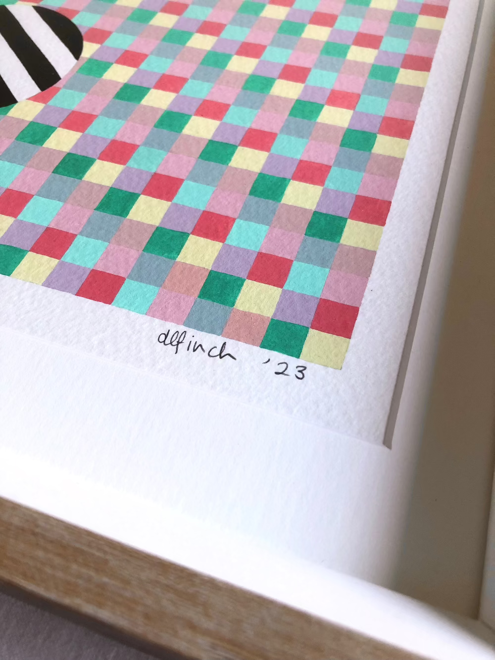 Close up of the artists signature 