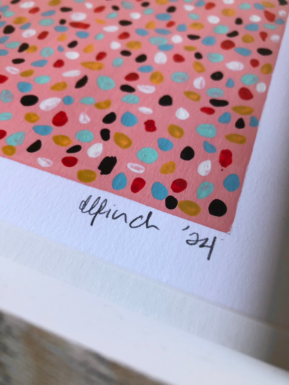 Close up of Pink Lady abstract artwork artists signature.