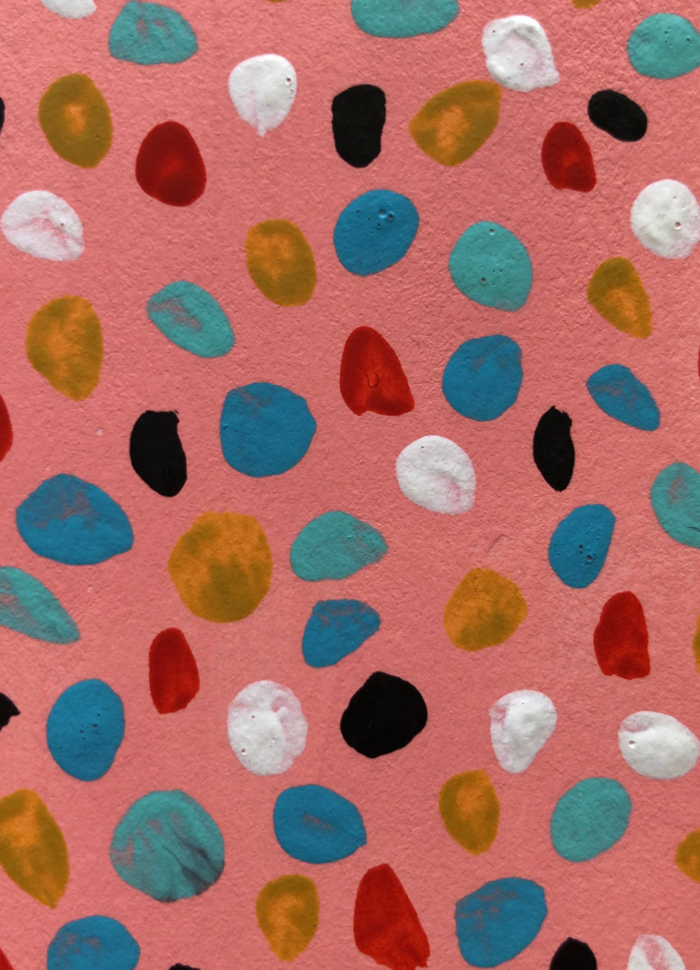 Close up of the dots of the Pink Lady artwork.