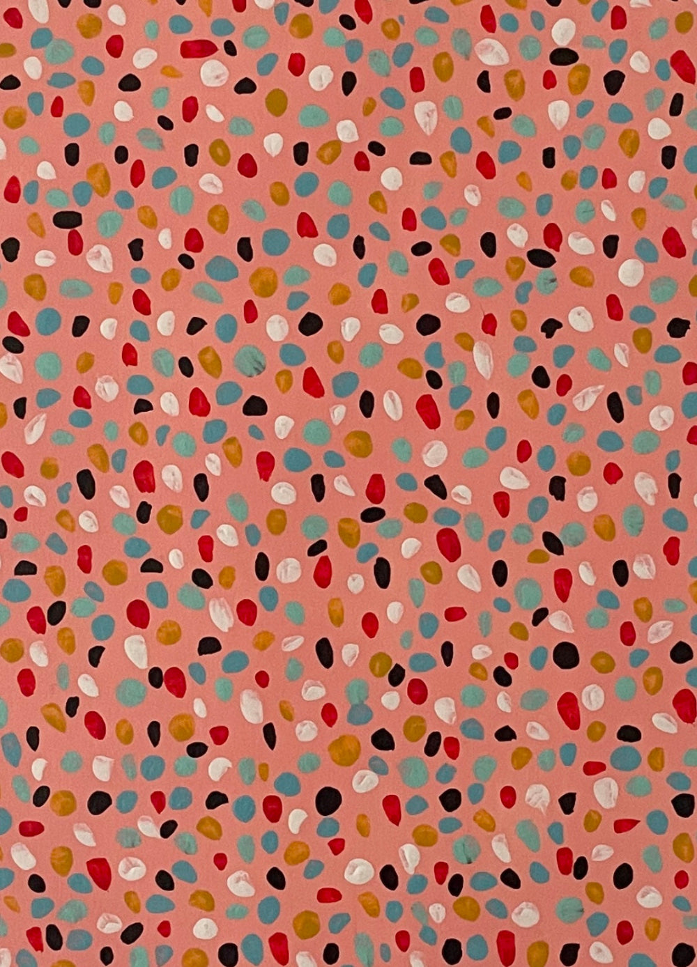 Close up of the colourful dots of the Pink Lady artwork