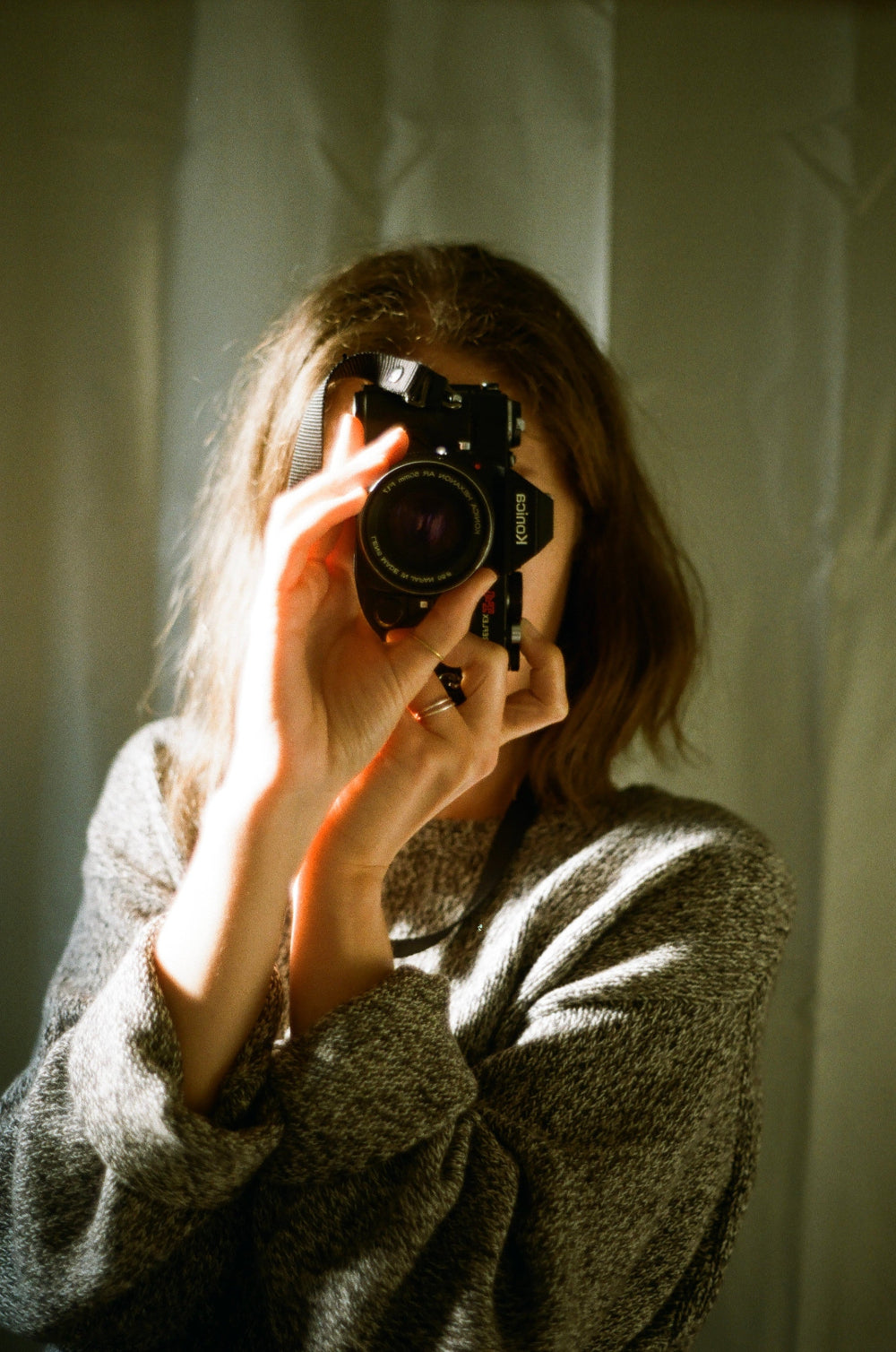 Self portrait of the artist and owner of the shop